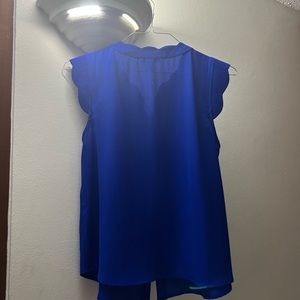 Royal Blue Blouse.  Condition: New. Size: L…up to 36 C bust.  Riffle sleeve